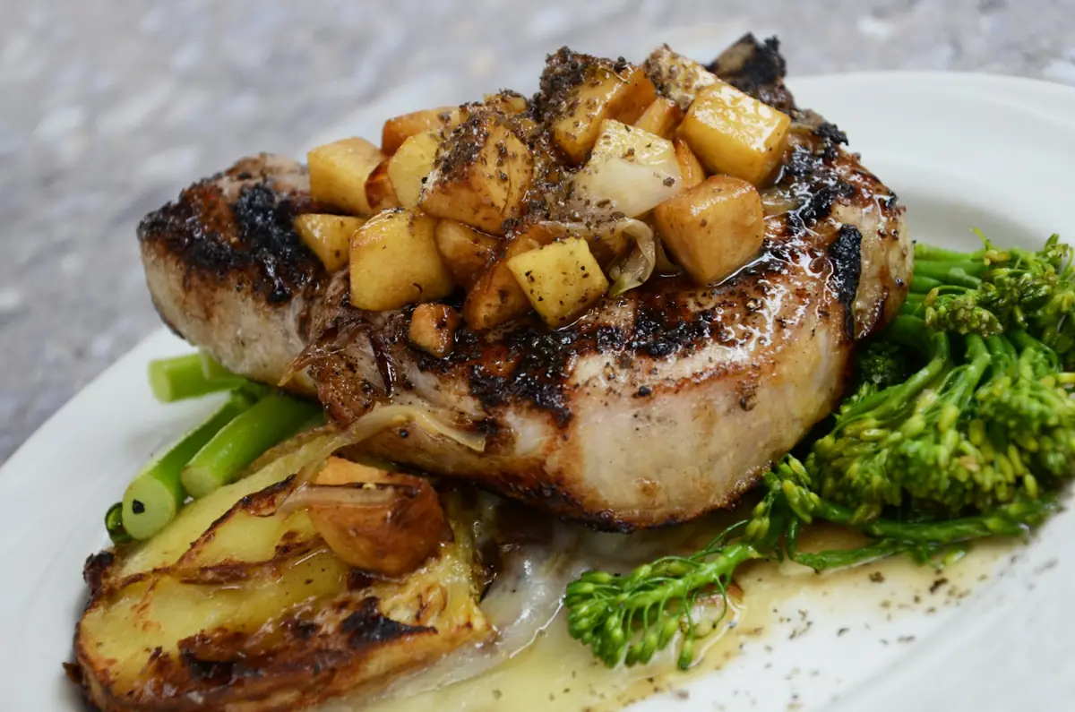 Plated pork chop with vegetables